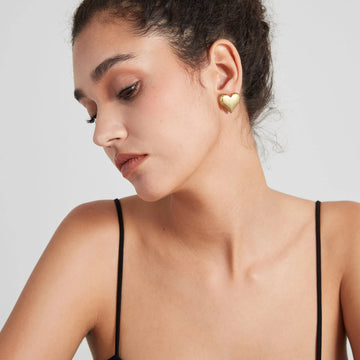 Golden, heart-shaped earrings