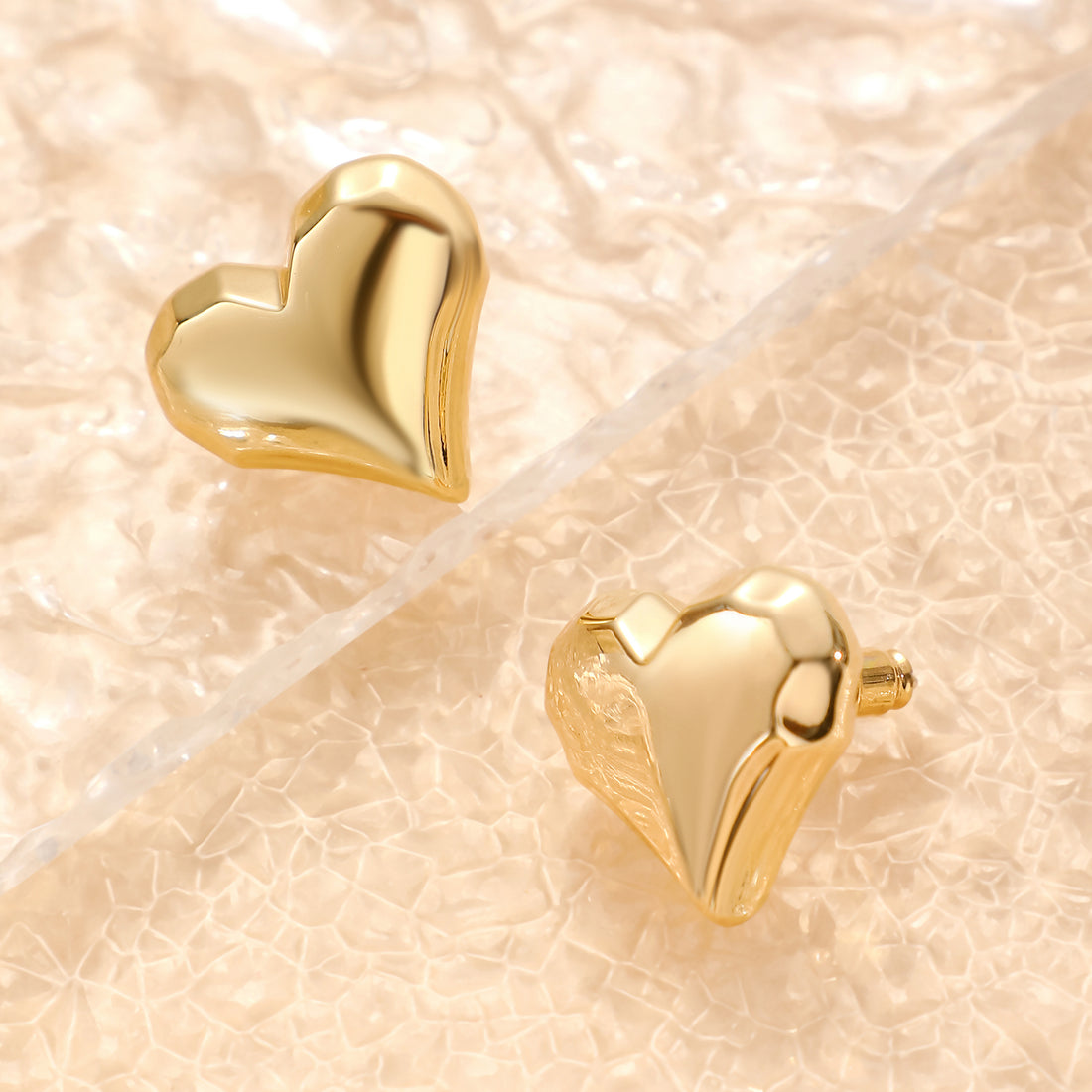 Golden, heart-shaped earrings