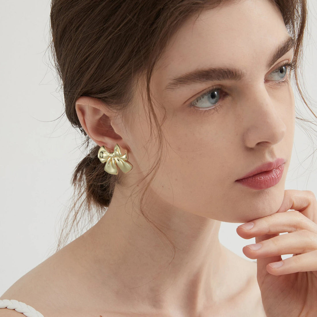Golden, bowknot earrings