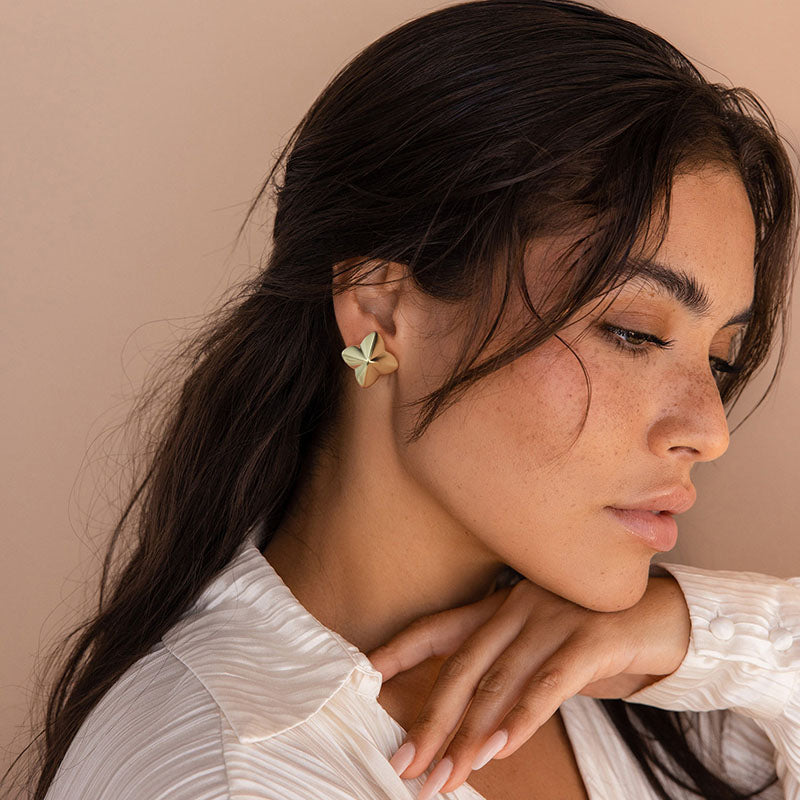 Golden, four-leaf clover shaped earrings