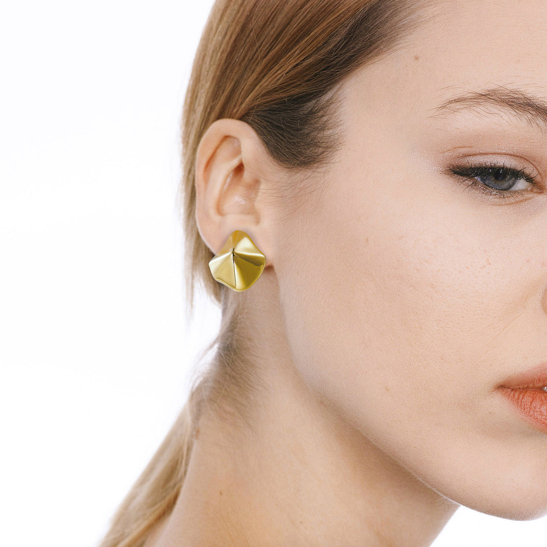 Golden, lotus leaf-shaped earrings