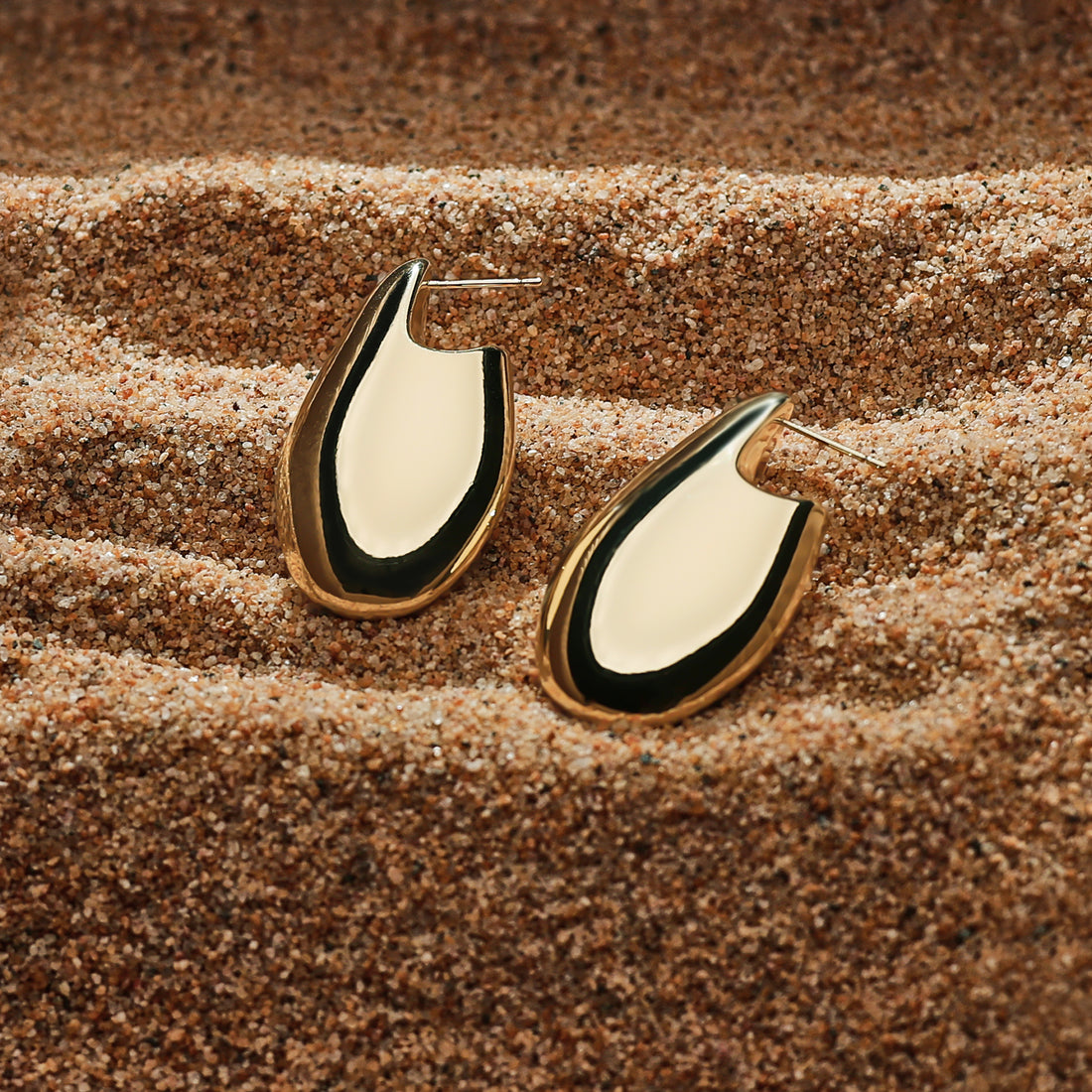 Golden, female pendant earrings
