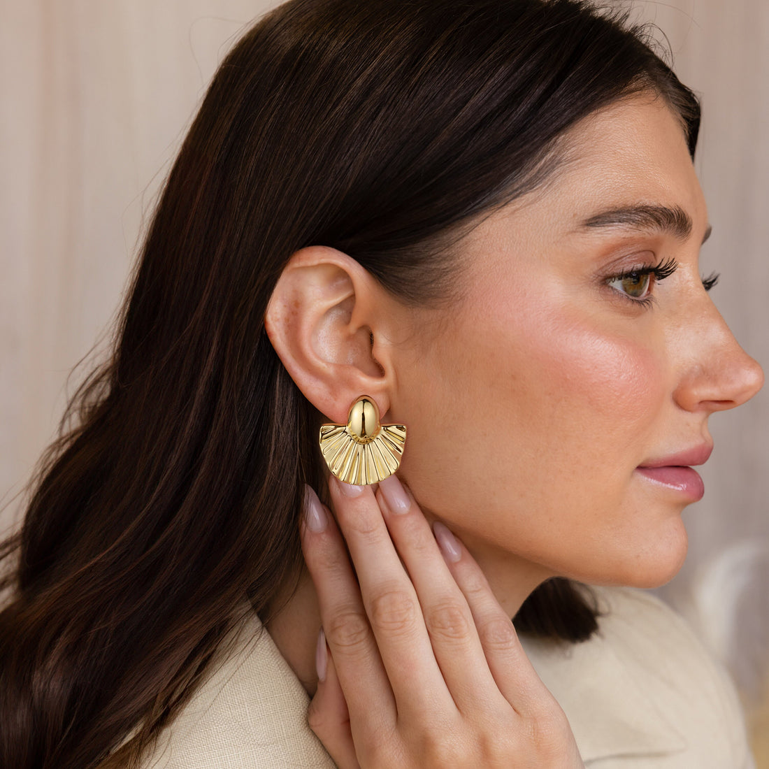 Golden, ginkgo leaf-shaped earrings