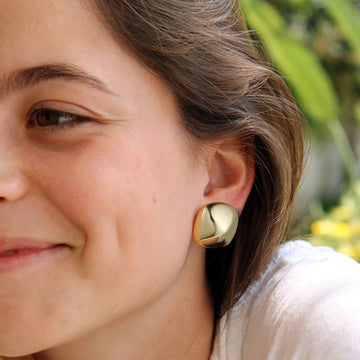 Golden, round quadrilateral earrings